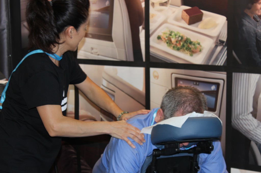 Akiko Takahashi, a senior therapist for Body Charge working at the Air New Zealand Booth, Sept. 2014