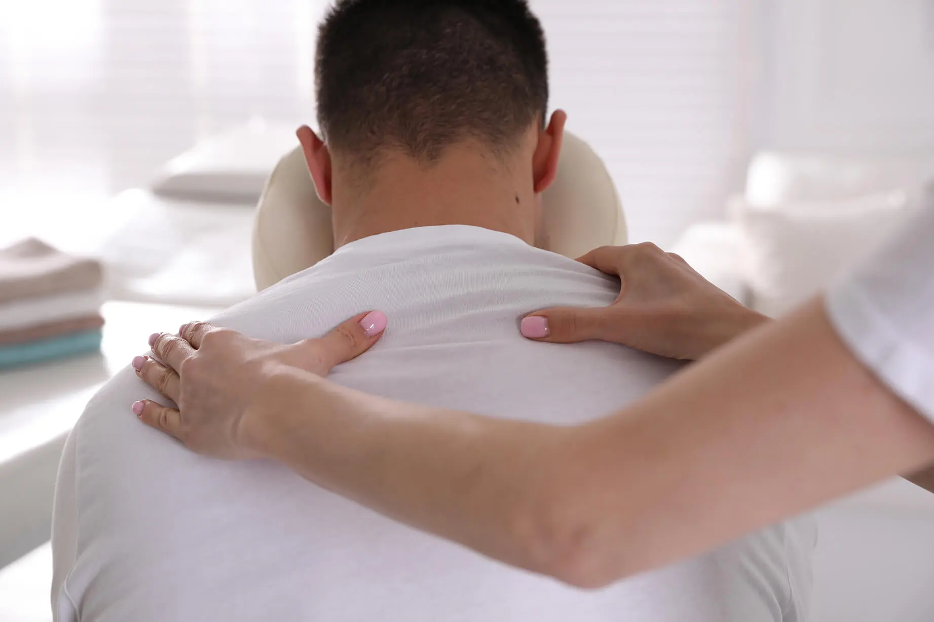 Person getting a shoulder massage